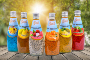 Basil Seed Drink with Orange, Pineapple, Lychee, Mango, Strawberry, and Cocktail flavors in glass bottles